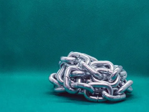 Large chain in a pile Stock Photos