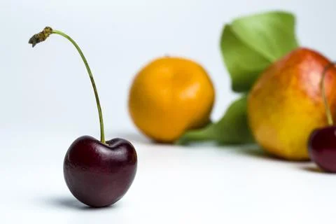 A large cherry on a white background Stock Photos