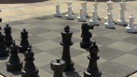 Large Chess Setup. Massive Chess Board Outdoors With Strategic Positioning And Stock Footage 337939386
