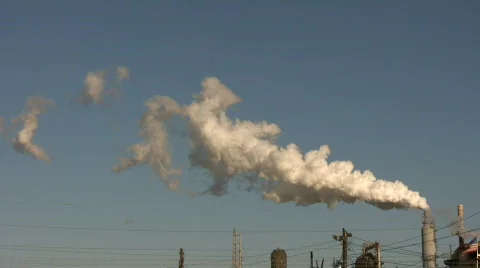 Large chimney is exhausting a long trail of fumes. Stock-Footage 359101