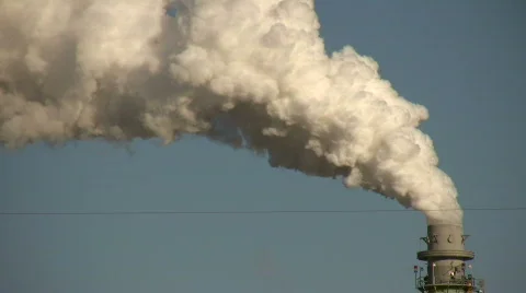 Large chimney is exhausting a long trail of fumes. Video stock 359102