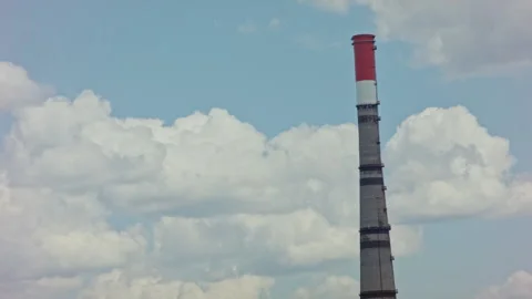 Large Chimney Pipe Against Blue Sky with Clouds Stock Footage 135725720