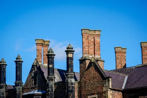 Large Chimney stacks on the St John University building Stock Photos