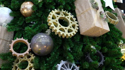Large Christmas tree decorated with large balls, gears and sealed gifts Stock Footage 145000226