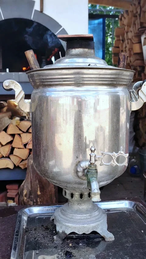 Large chrome-plated bronze samovar for water heating and tea drinking, close-up. Video stock 278317349