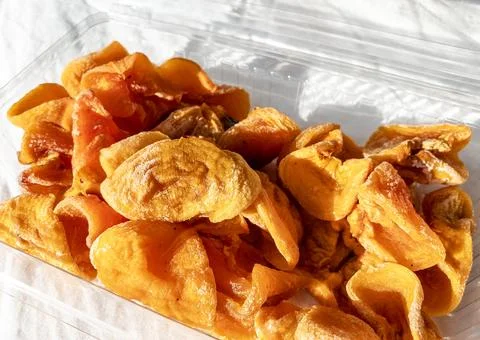 Large chunks of dried Persimmon fruit Stock Photos