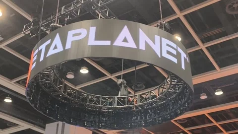 Large circular electronic sign suspended in a convention hall Stock Footage 344320591