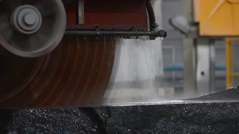 Large circular saw blade cuts stone Stock Footage 155095996