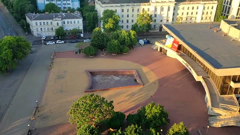 Large city square between buildings in the city on a summer morning Stock Footage 327540239