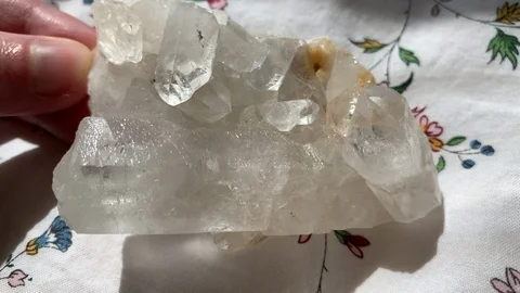 Large Clear Quartz Crystal in Sunlight Stock Footage 127119705