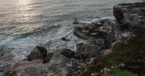 Large Cliffs With Waves Below At Dawn 4K Video stock 155547327