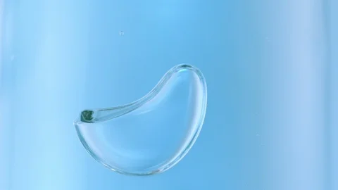 Large closeup Bubbles moving around in water, slow motion Stock Footage 92802439