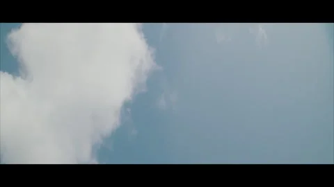 Large Cloud Blue Sky Anamorphic Stock Footage 314909826