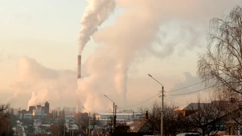 A large cloud of chemicals is released from the plant's large pipe Stock Footage 150683426