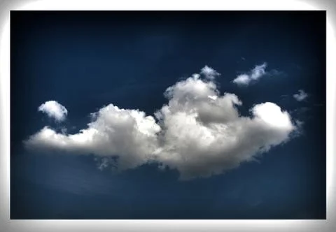 Large Cloud Floating Alone in Dark Blue Sky Stock-Fotos