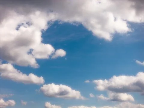 Large Cloud Masses Divided by a Blue Sky Gap Stock Photos