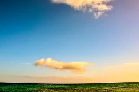 A large cloud in the sky is visible in the distance Stock Photos