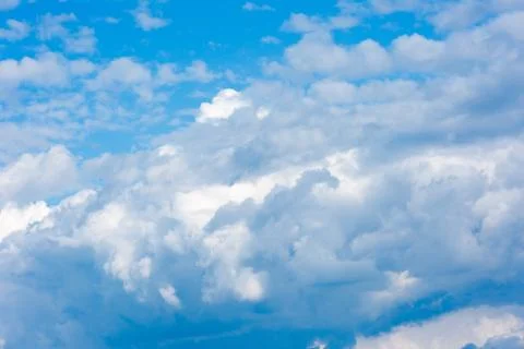 Large clouds and storm clouds close-up. Stock Photos