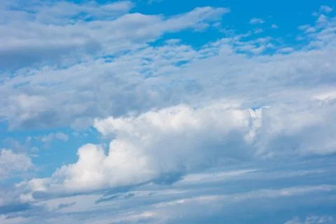 Large clouds and storm clouds close-up. Stock Photos