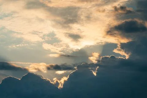 Large clouds and sunlight Stock Photos