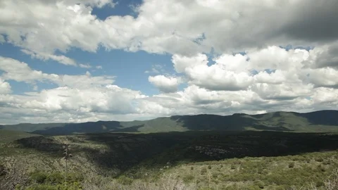 Large clouds over mountains in New Mexico Stock Footage 104877312