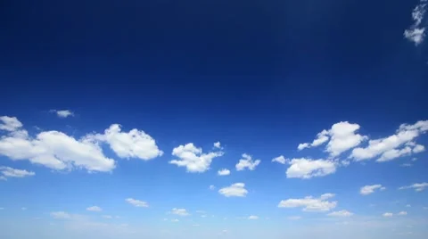 Large clouds slowly move together on blue sky day time lapse. Video stock 8404414