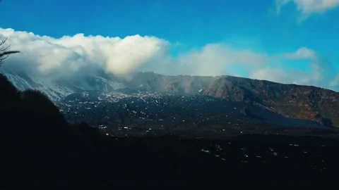 Large cluster of clouds from the top of a volcano. Stock Footage 237077447