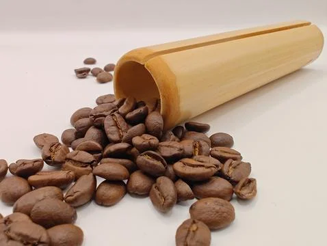 Large coffee beans on a white background Stock Photos