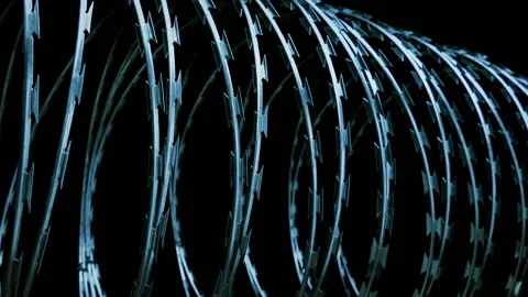 Large Coils Of Razor Wire Closeup Stockbeeldmateriaal 236476487