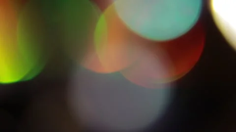Large colored bokeh flickering in the background Видео 309593725