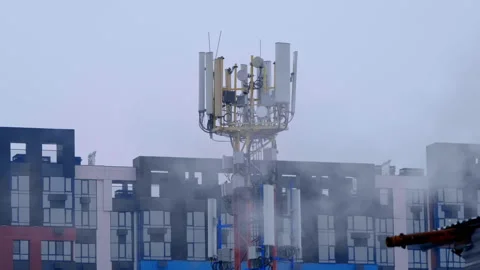 A large complex of antennas mobile communication and internet in the city Stock Footage 229826578