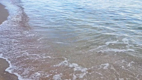 A large concrete pipe lying in the sea on the shore. Video stock 122107052