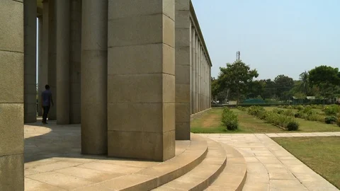 Large Concrete Structure Next to Garden Stock Footage 112642874