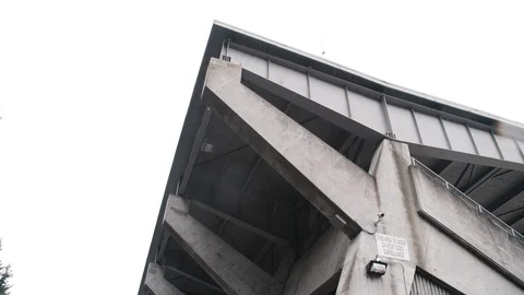 Large concrete track stadium on cloudy day Stock Footage 96088025