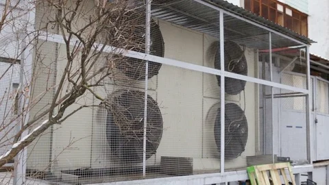 A large condenser heat exchanger is integrated into the building. The overall pl Stock Footage 85092206