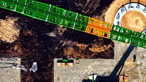 Large construction crane and its shadow. Aerial top-down view Stock Footage 331336858