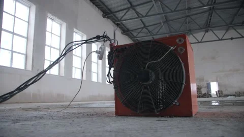 Large Construction Electric Heater in A Spacious Room. Stock Footage 174733963