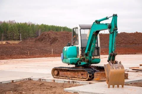 Large construction excavator at construction work. Special machinery Stock Photos
