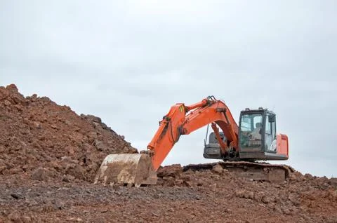 Large construction excavator at construction work. Special machinery Stock Photos
