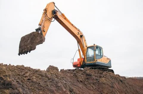 Large construction excavator at construction work. Special machinery Stock Photos