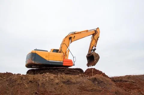 Large construction excavator at construction work. Special machinery Stock Photos