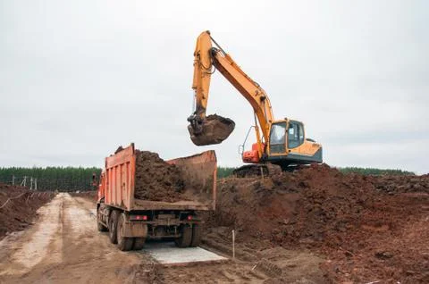 Large construction excavator at construction work. Special machinery Stock Photos