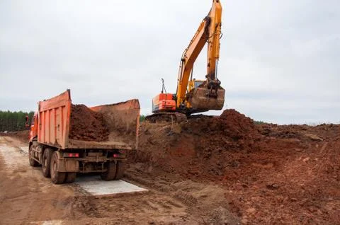 Large construction excavator at construction work. Special machinery Stock Photos