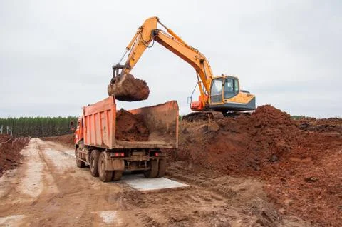 Large construction excavator at construction work. Special machinery Stock Photos