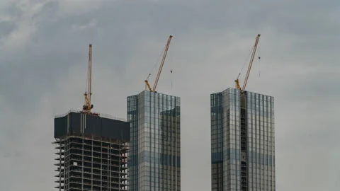 Large construction site with busy cranes. Stock Footage 154797024