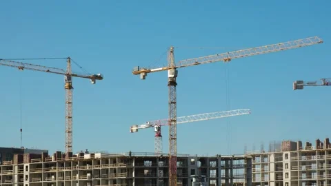 Large construction site with busy cranes. Time lapse. Stock Footage 284359198