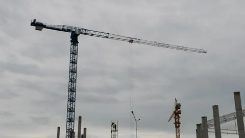 Large construction site in the city with two construction cranes. Stock Footage 335245262