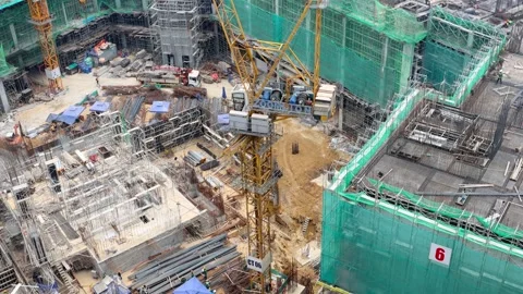 Large Construction Site With Cranes and Buildings Stock Footage 318408181
