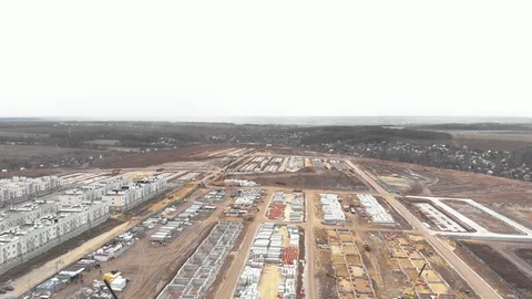 Large construction site during work hours - Top down aerial footage Stock Footage 120846746