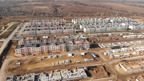 Large construction site during work hours - Top down aerial footage Stock Footage 120848928